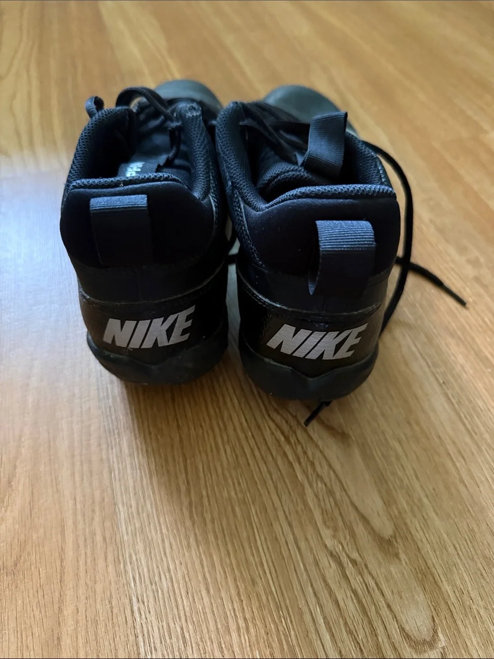 Nike Black Men's Athletic Cleats with White Swoosh